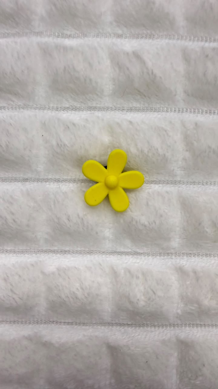 Charm flor amarilla Crocs