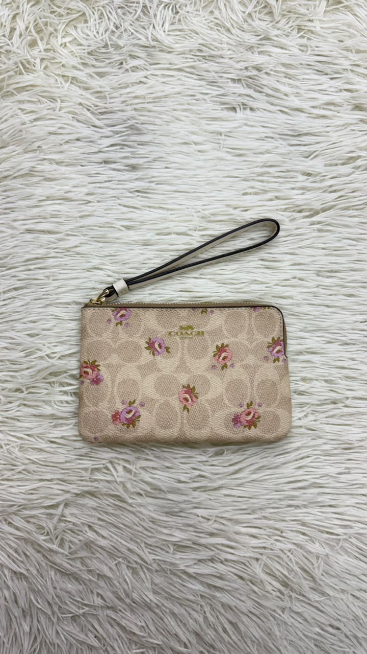 Muñequera café Coach