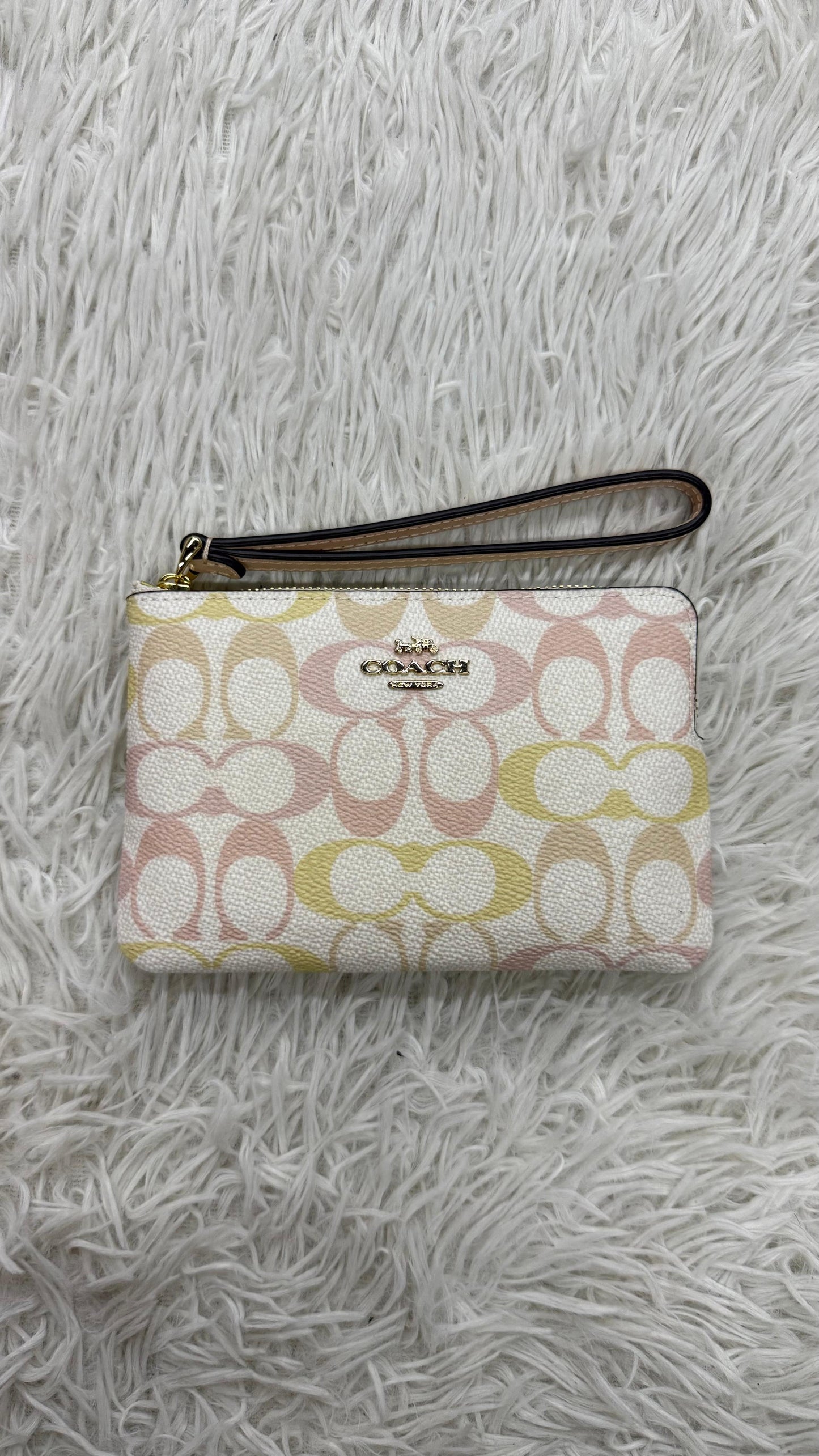 Muñequera crema Coach