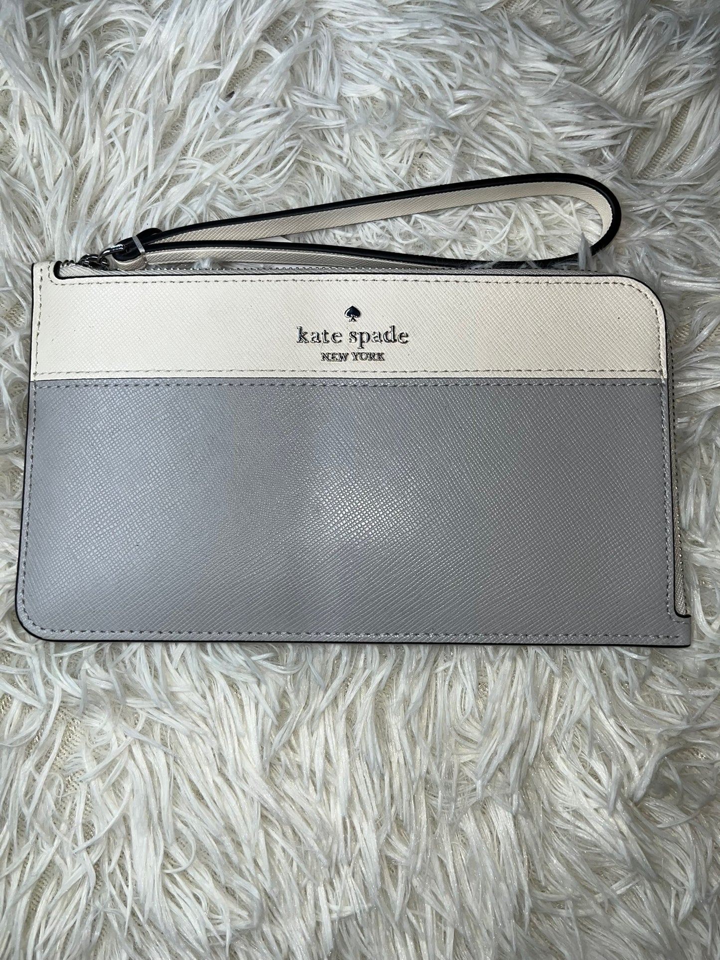 Muñequera gris Kate spade