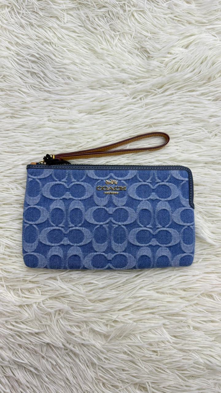 Muñequera azul Coach