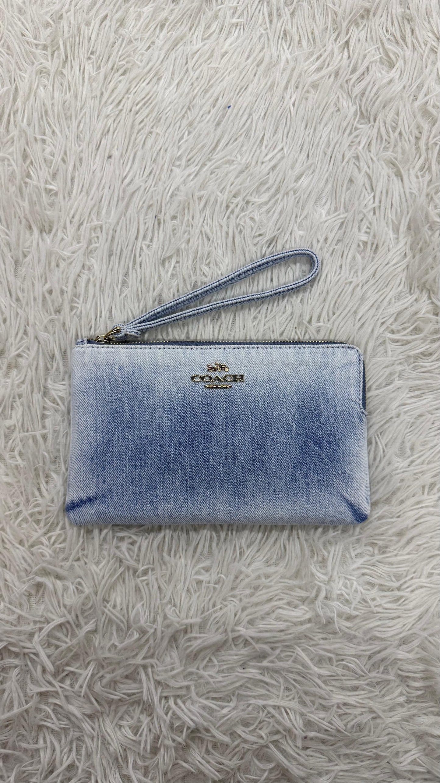 Muñequera mezclilla azul Coach
