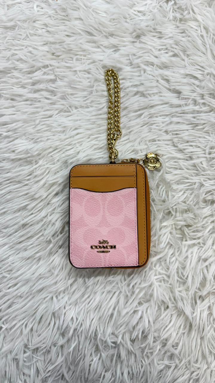 Monedero rosa Coach
