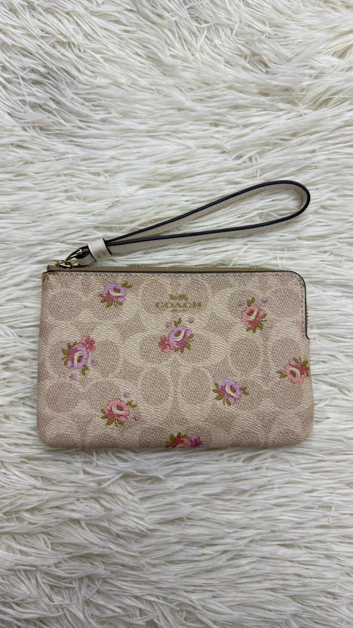 Muñequera beige Coach