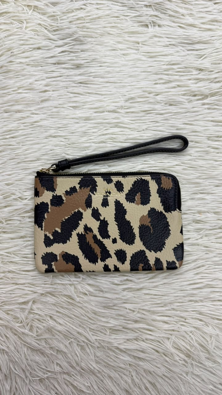 Muñequera animal print Coach