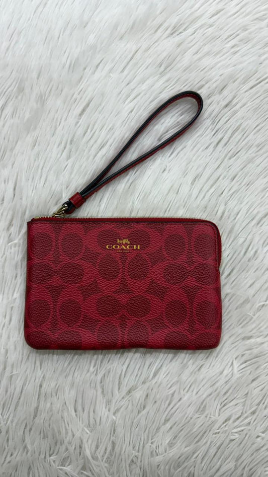 Muñequera roja Coach