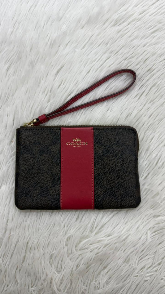 Muñequera café Coach