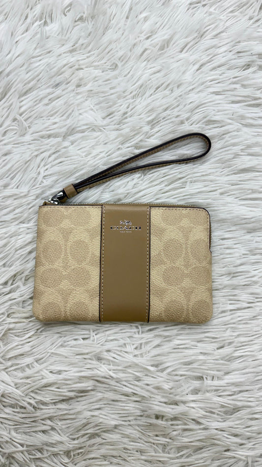 Muñequera café Coach