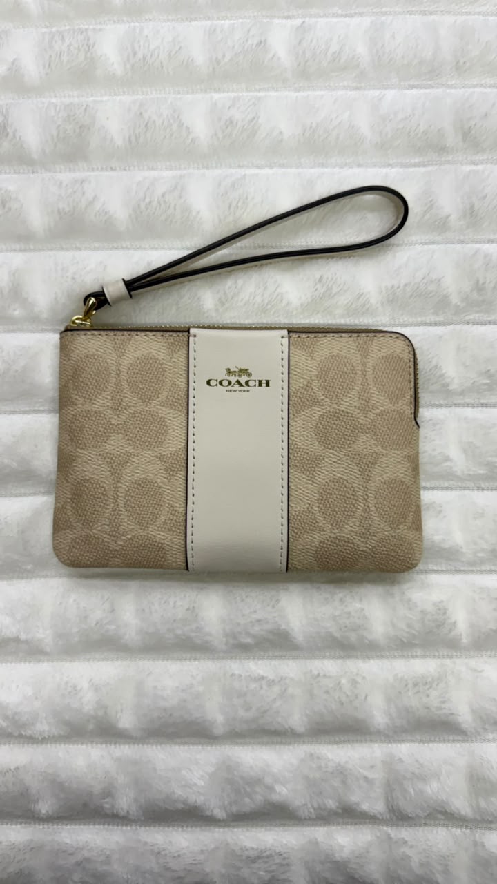 Muñequera beige Coach