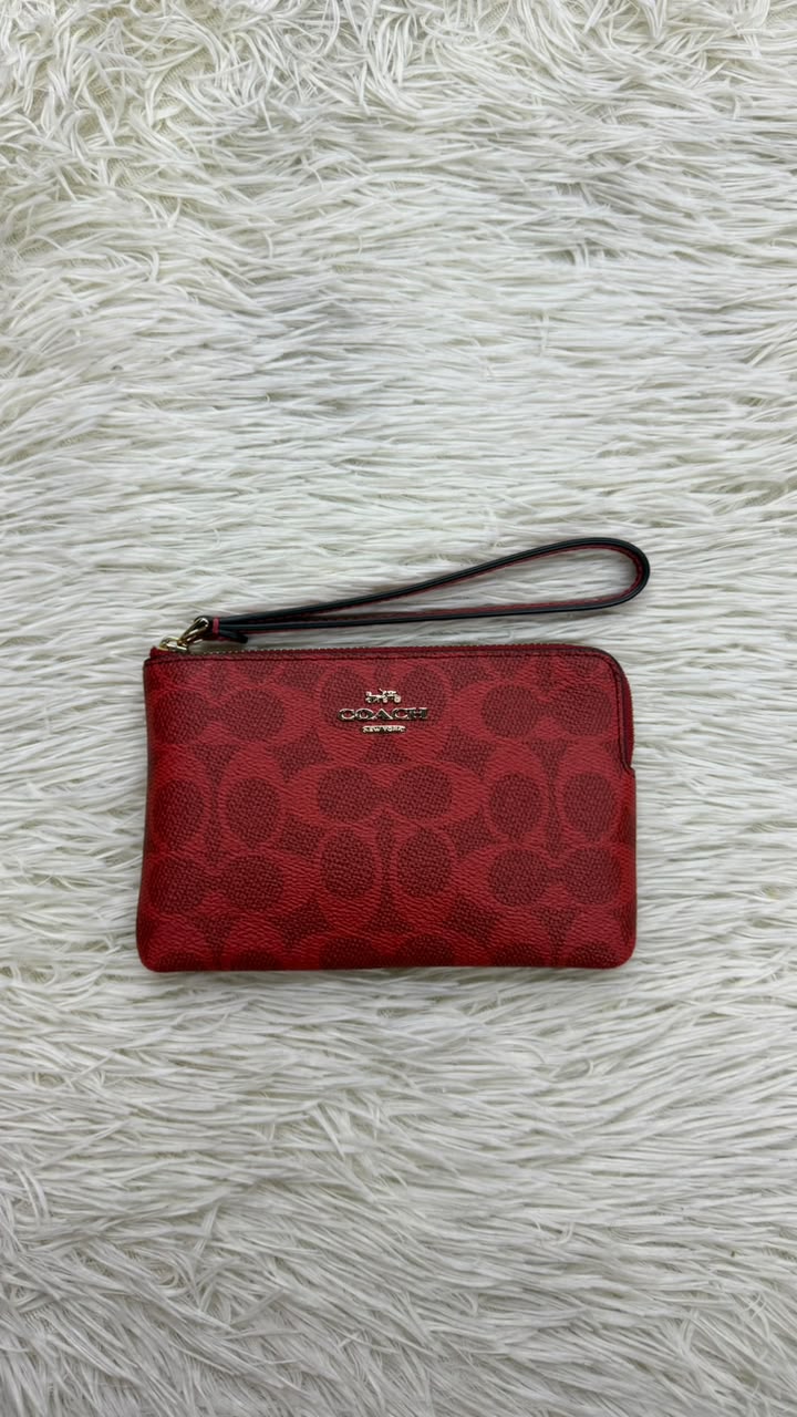 Muñequera roja Coach