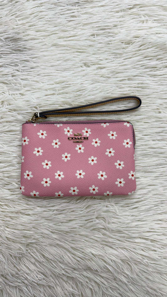 Muñequera rosa Coach