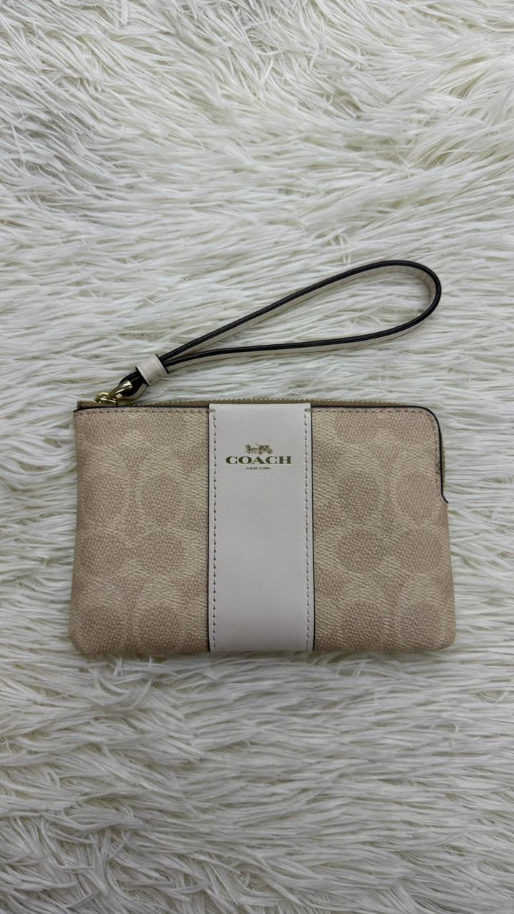 Muñequera beige Coach