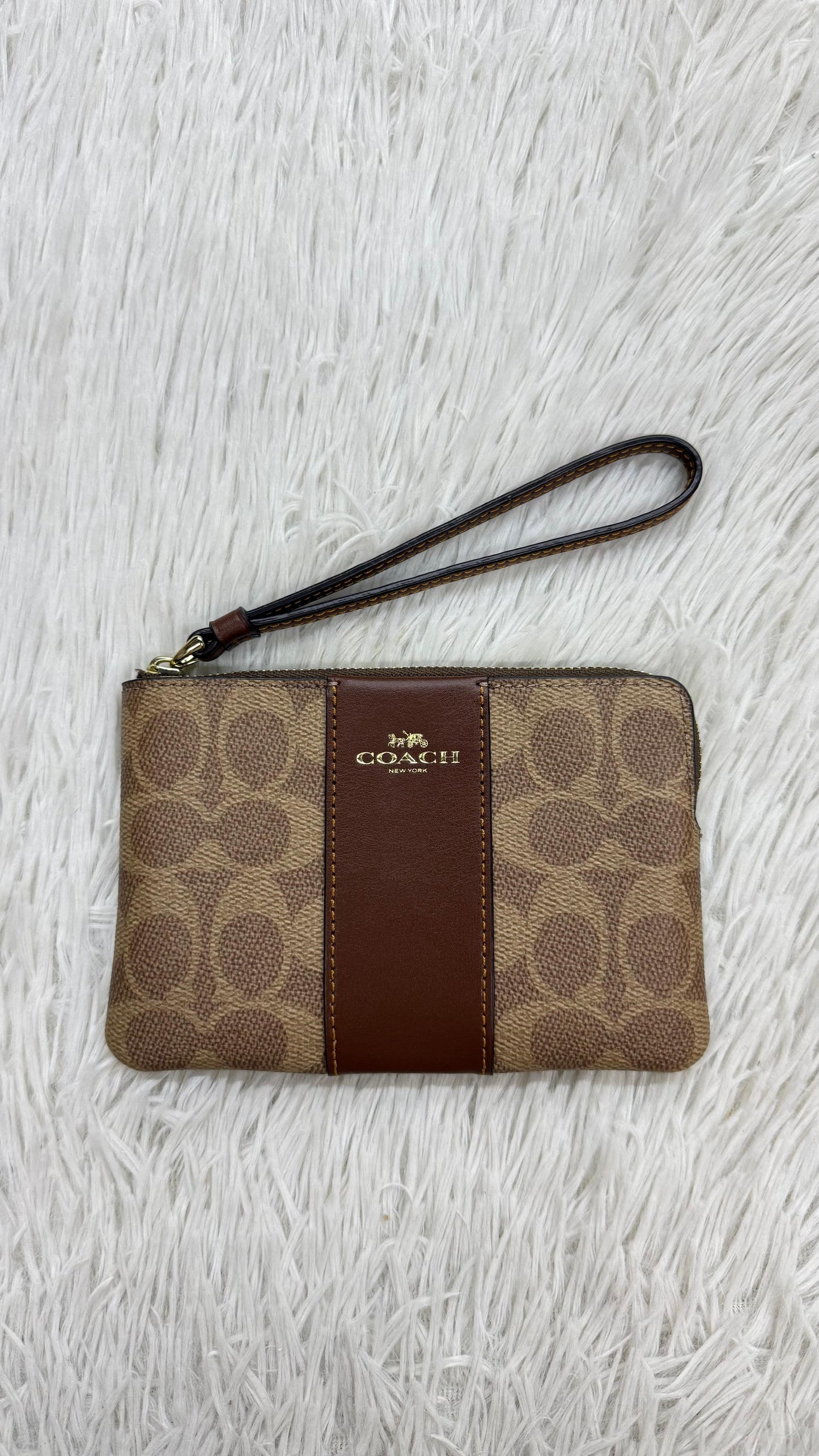 Muñequera café Coach