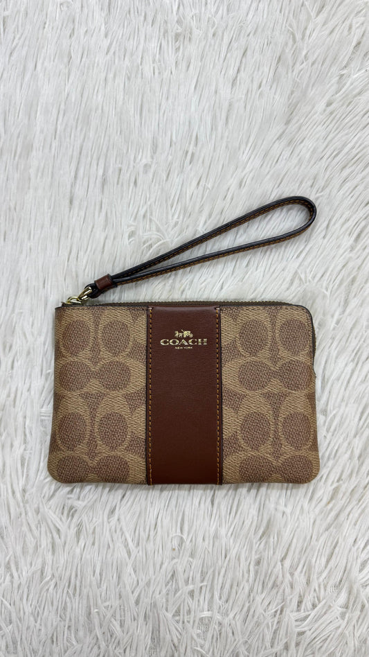 Muñequera café Coach