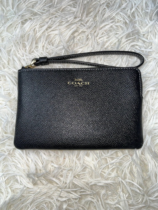 Muñequera negra Coach