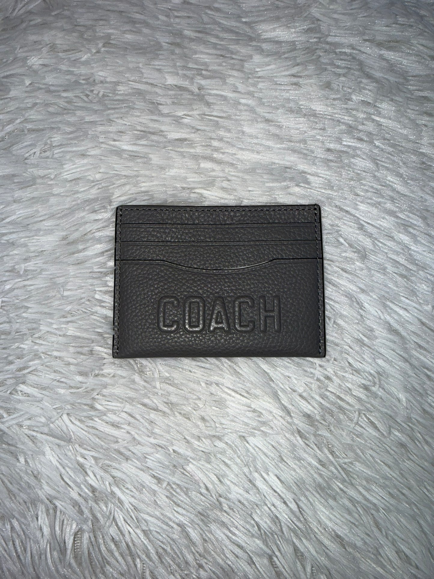 Tarjetero negro Coach