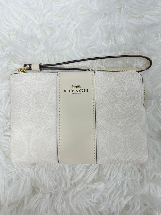 Muñequera blanca Coach