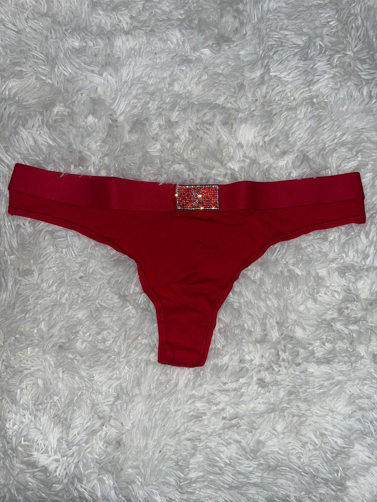 Thong rojo con brillitos L Victoria secret