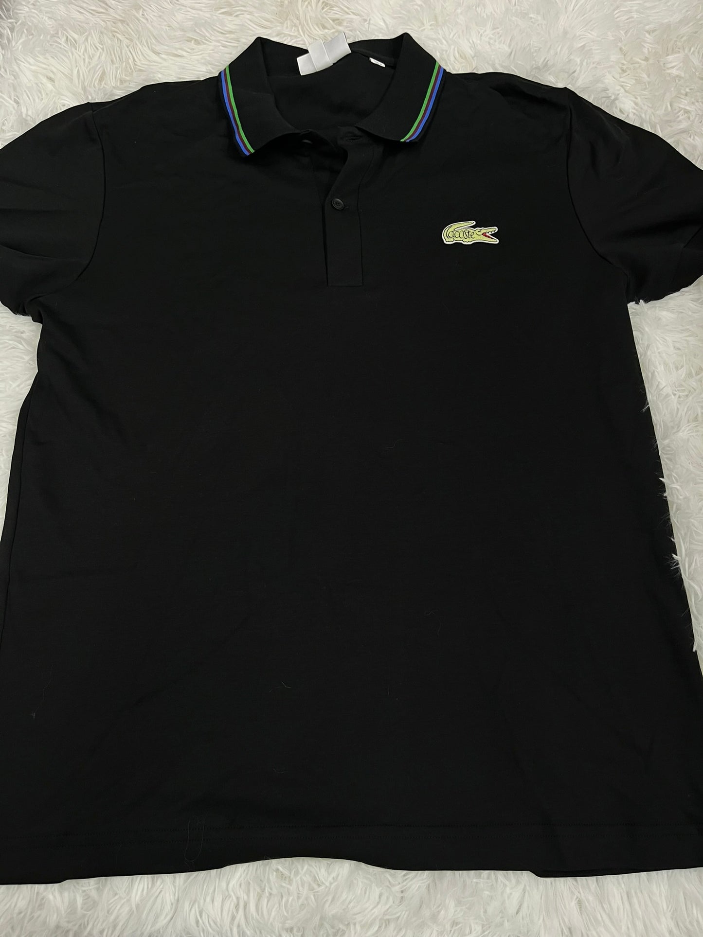 Polo negro M Lacoste