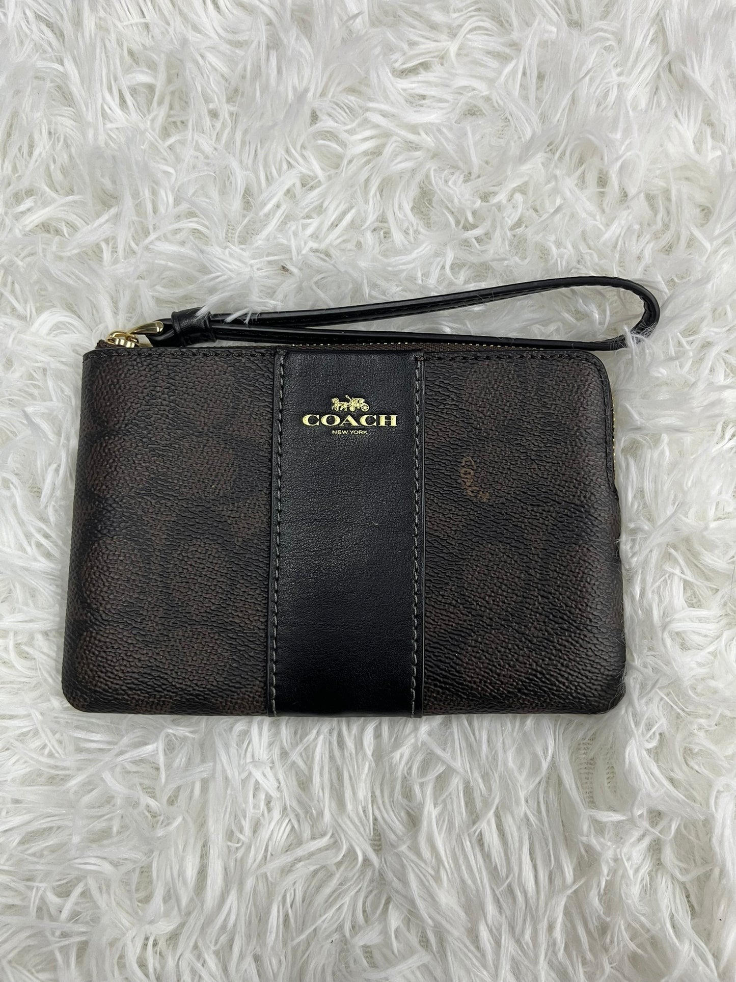 Muñequera café Coach