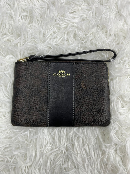 Muñequera café Coach