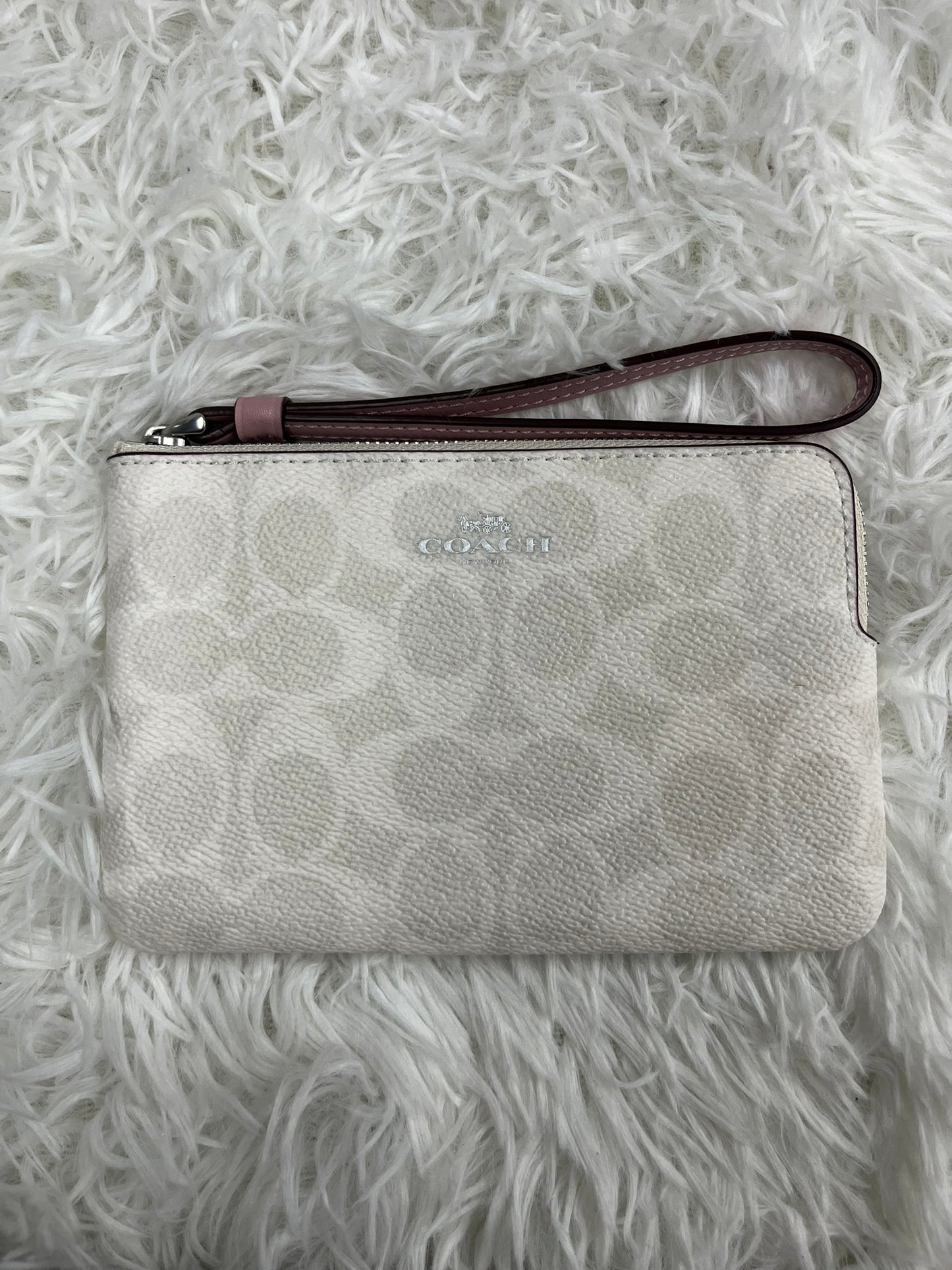 Muñequera blanca Coach