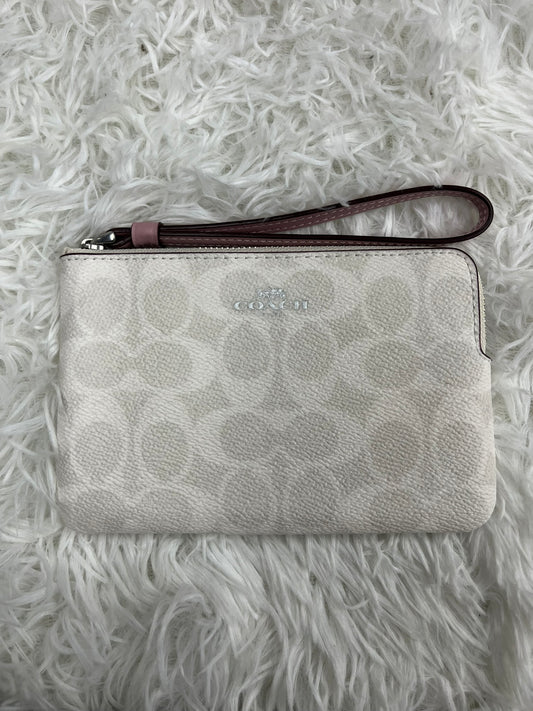 Muñequera blanca Coach