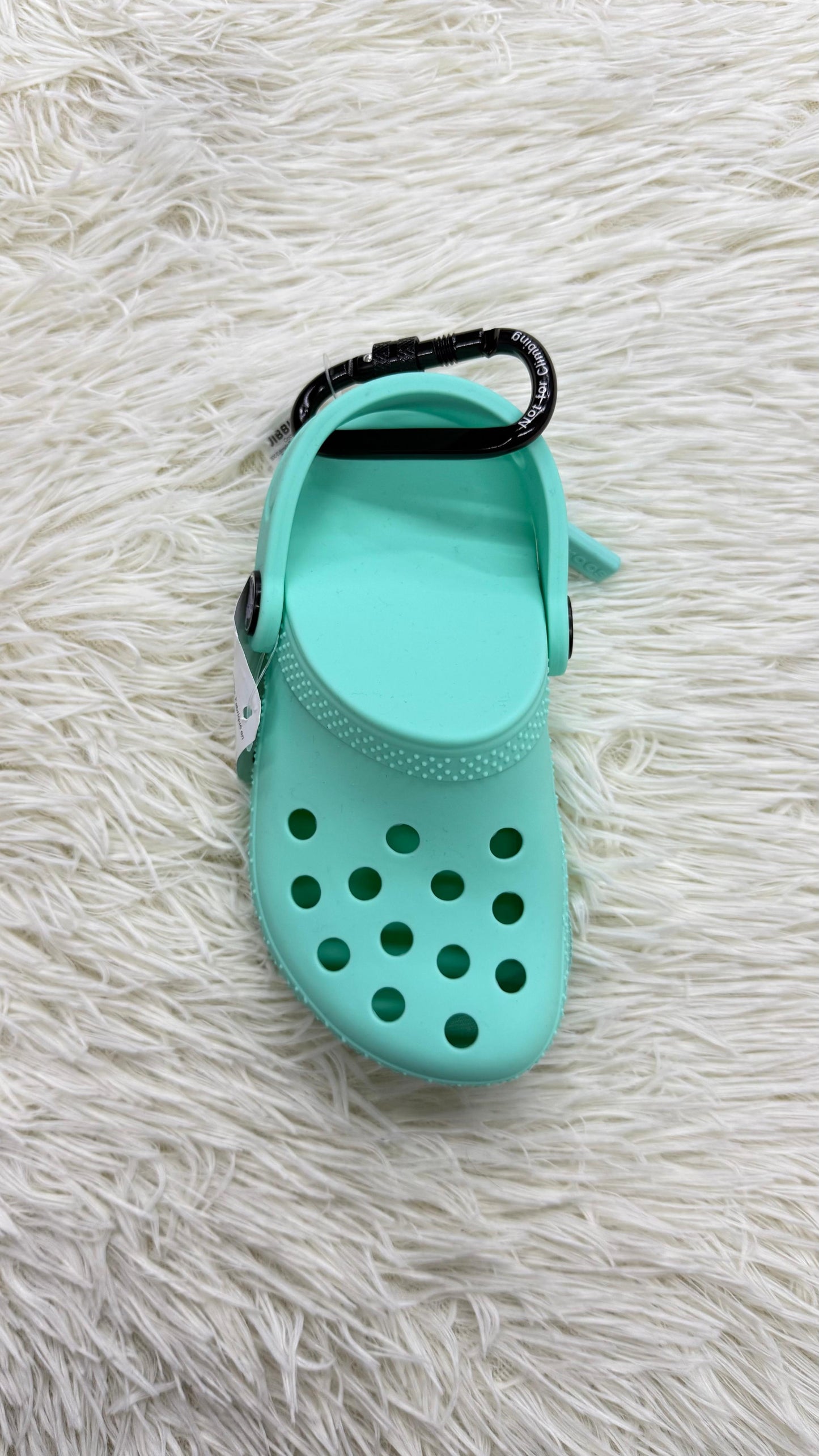 Monedero turquesa Crocs