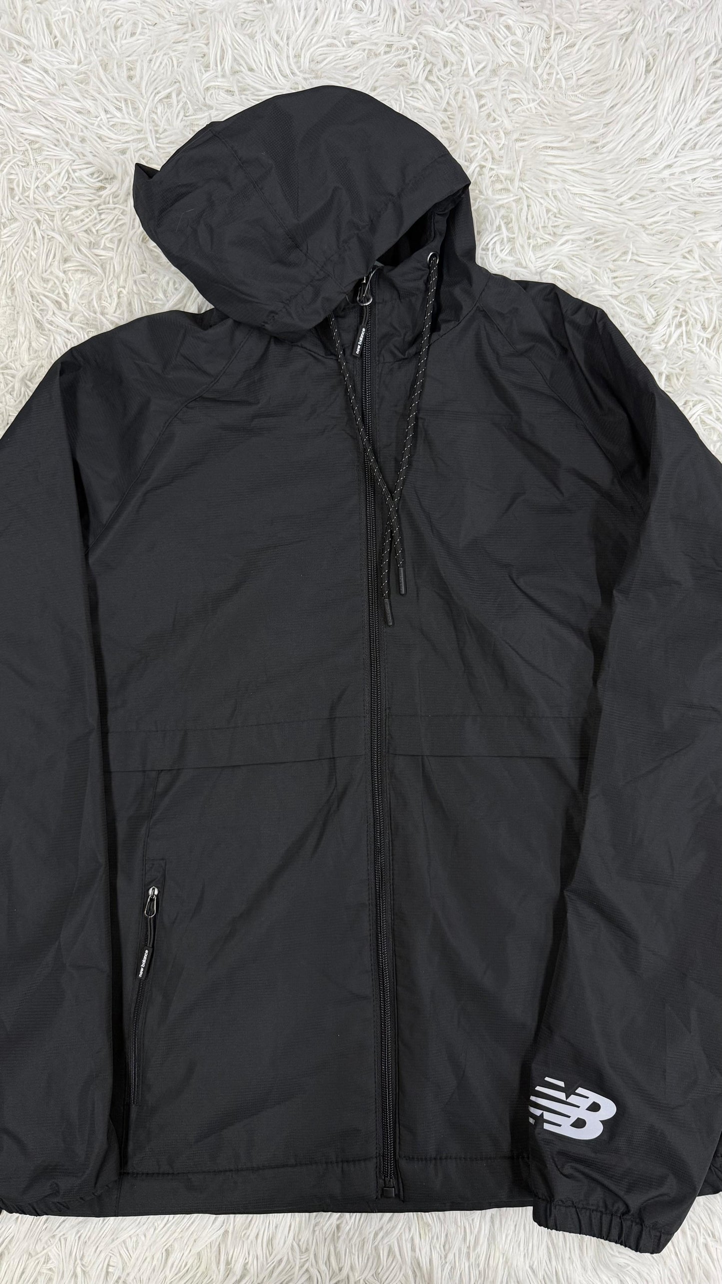Rompevientos negro M New balance