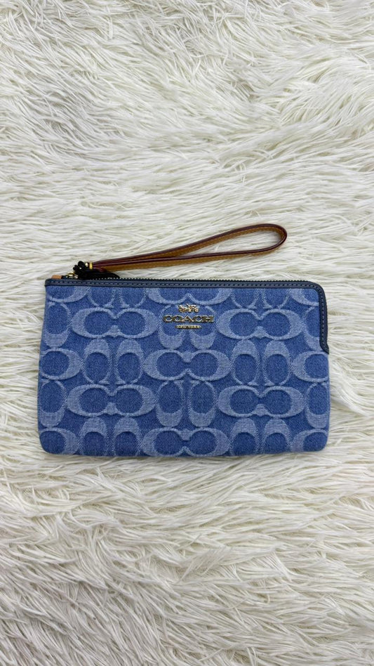 Muñequera azul Coach
