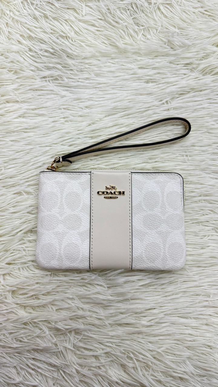 Muñequera blanco Coach