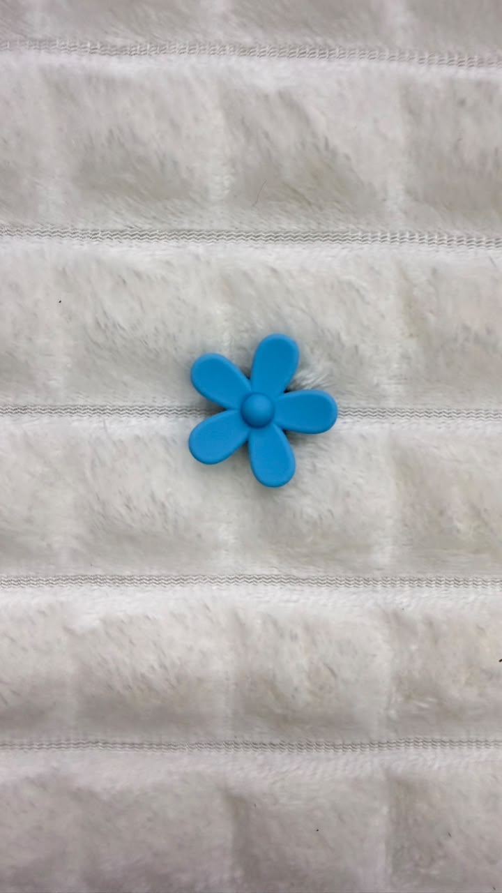 Charm flor azul Crocs