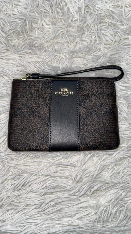 Muñequera café Coach