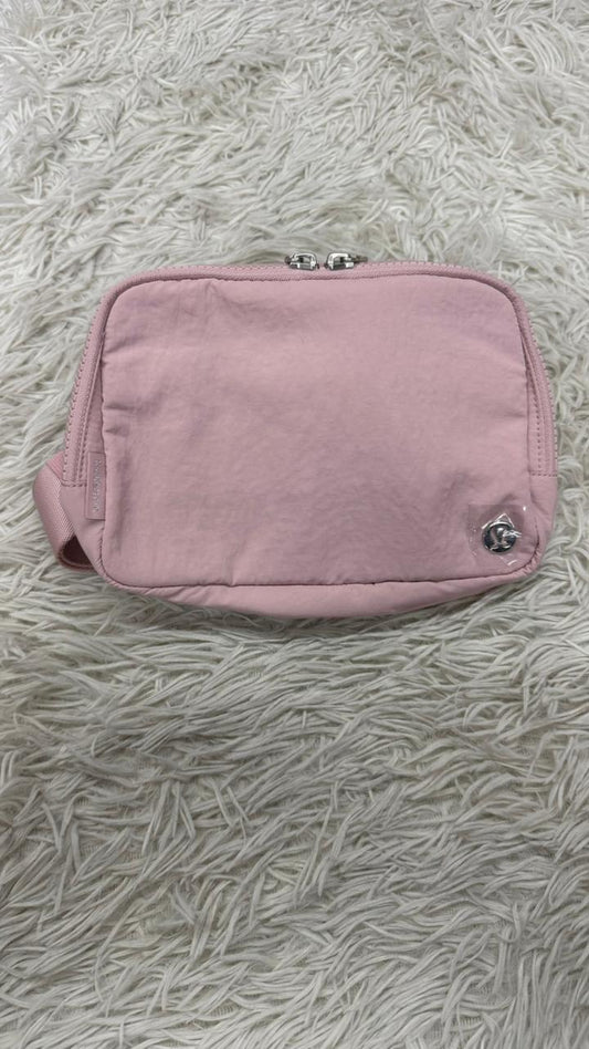 Cangurera rosa Lululemon