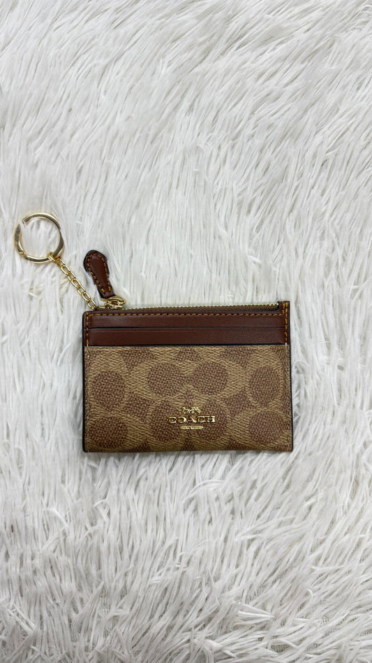 Tarjetero café Coach