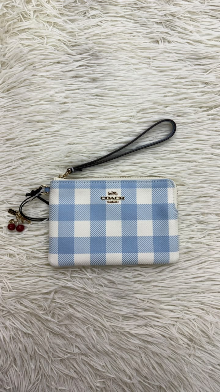Muñequera azul Coach