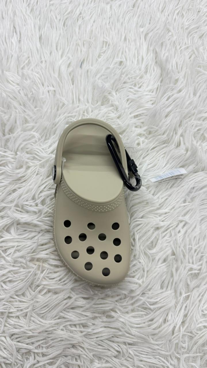 Monedero beige Crocs